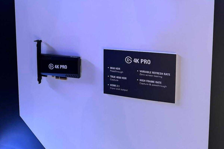 Elgato capture card 4K Pro mounted on a wall next to a board listing its key specifications