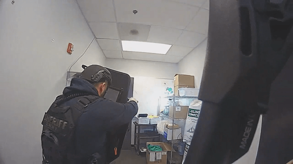 Bodycam shows law enforcement combing through New Albany warehouse