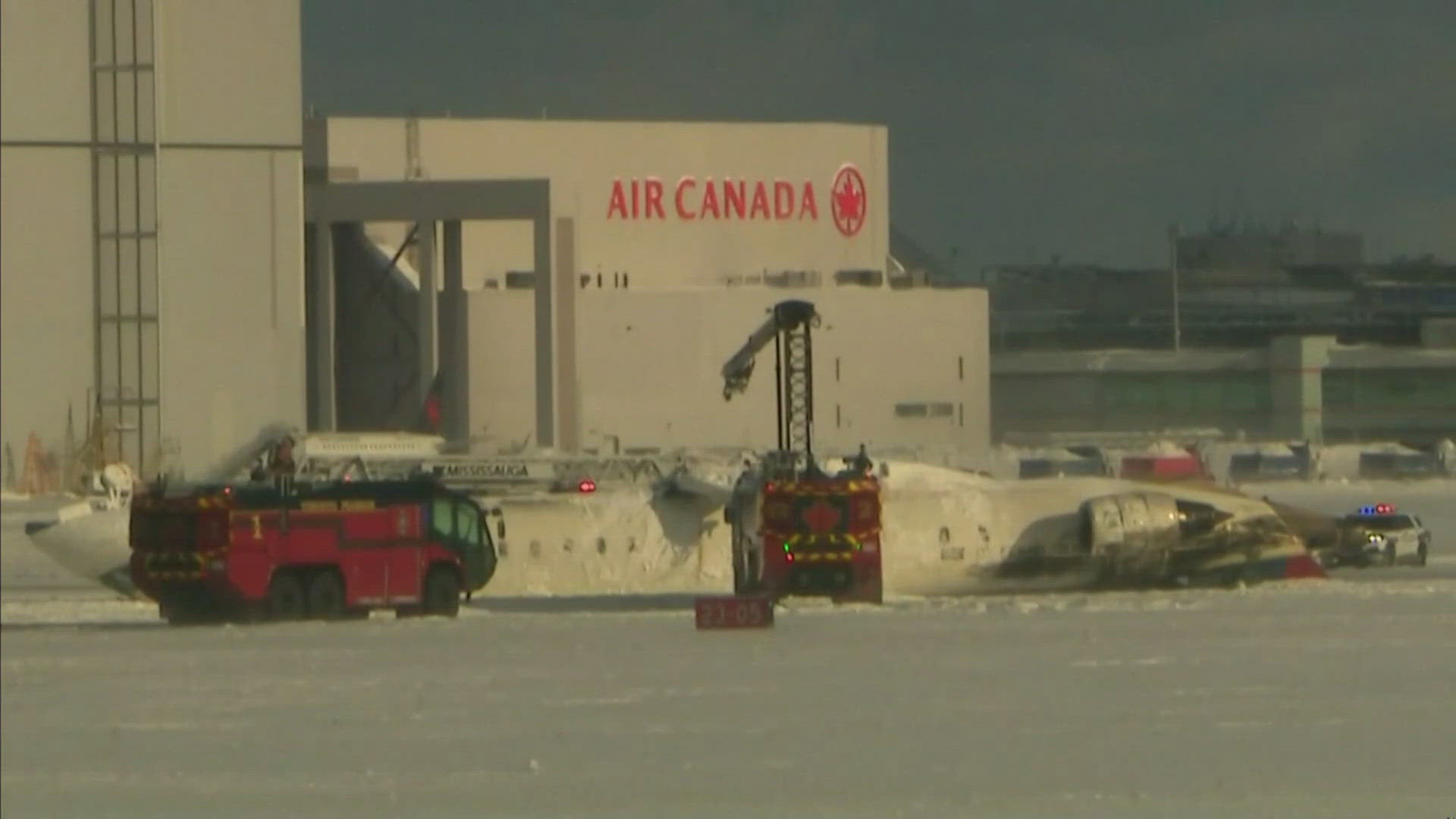 Plane crashes at Toronto airport, flips upside down
