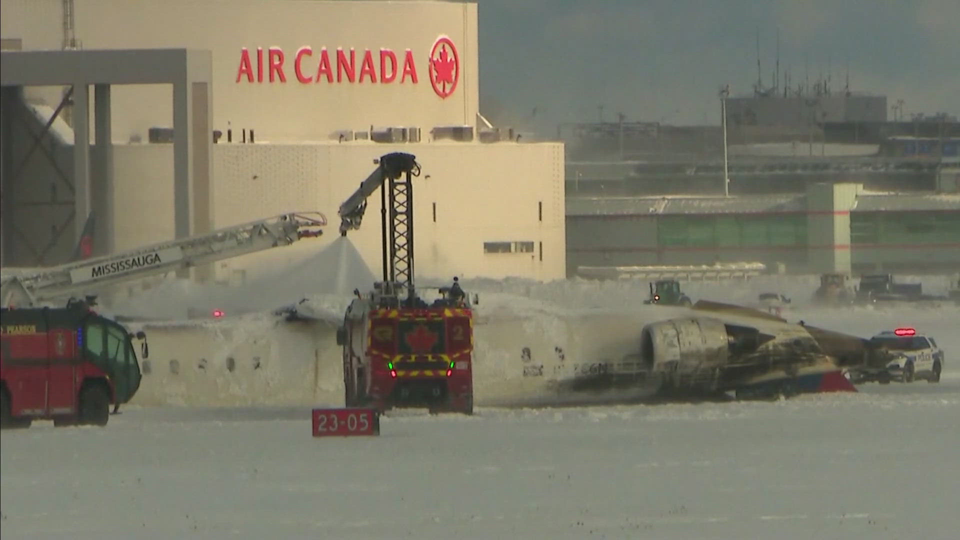 Delta plane flips on landing in Toronto, at least 15 injured