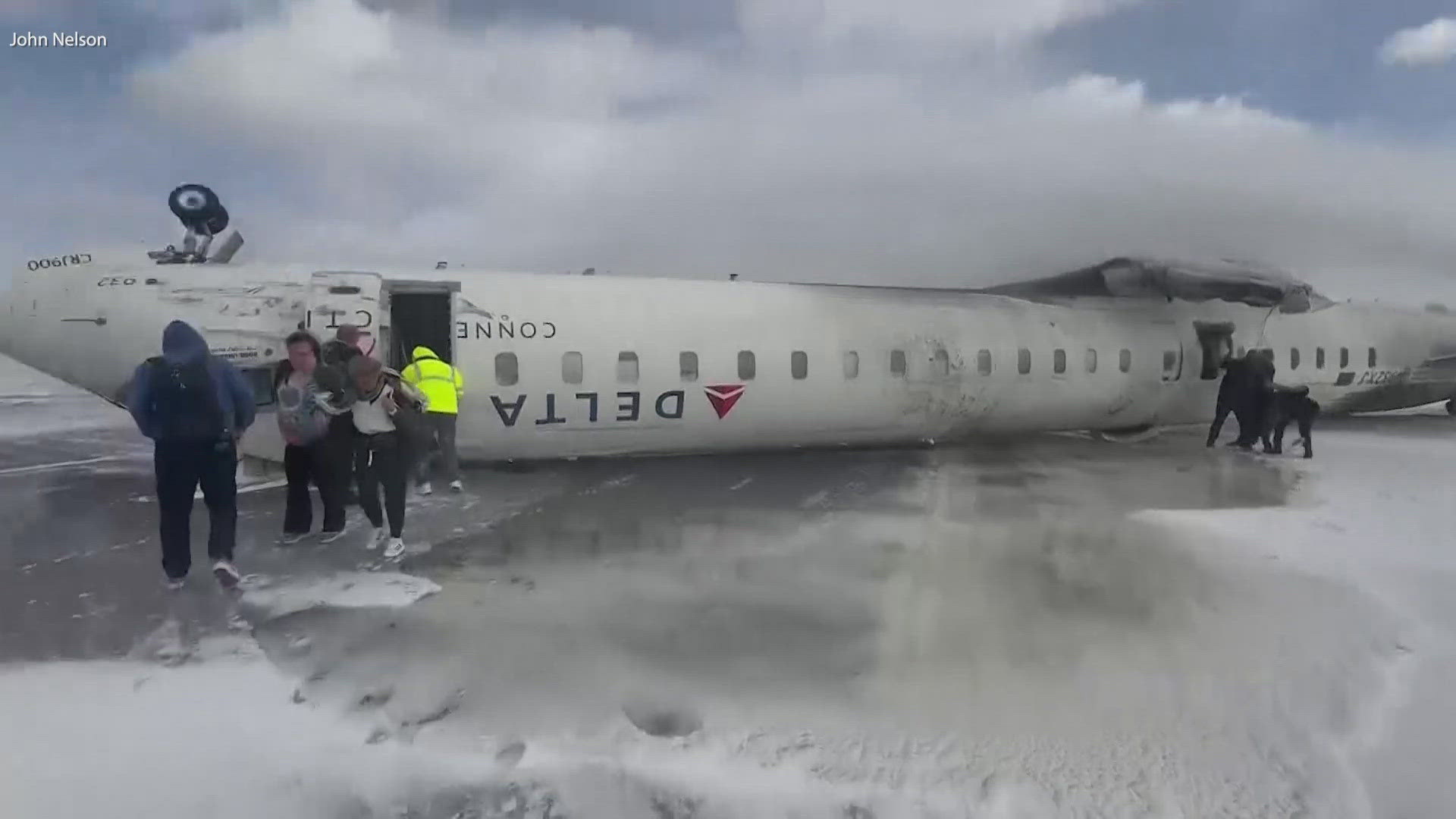 Toronto plane crash Delta flight flips on airport runway
