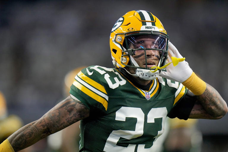 Cornerback Jaire Alexander (23) reacts after intercepting a pass during the first quarter of the wild card playoff game against the Dallas Cowboys Sunday, January 14, 2024 at AT&T Stadium in Arlington, Texas.