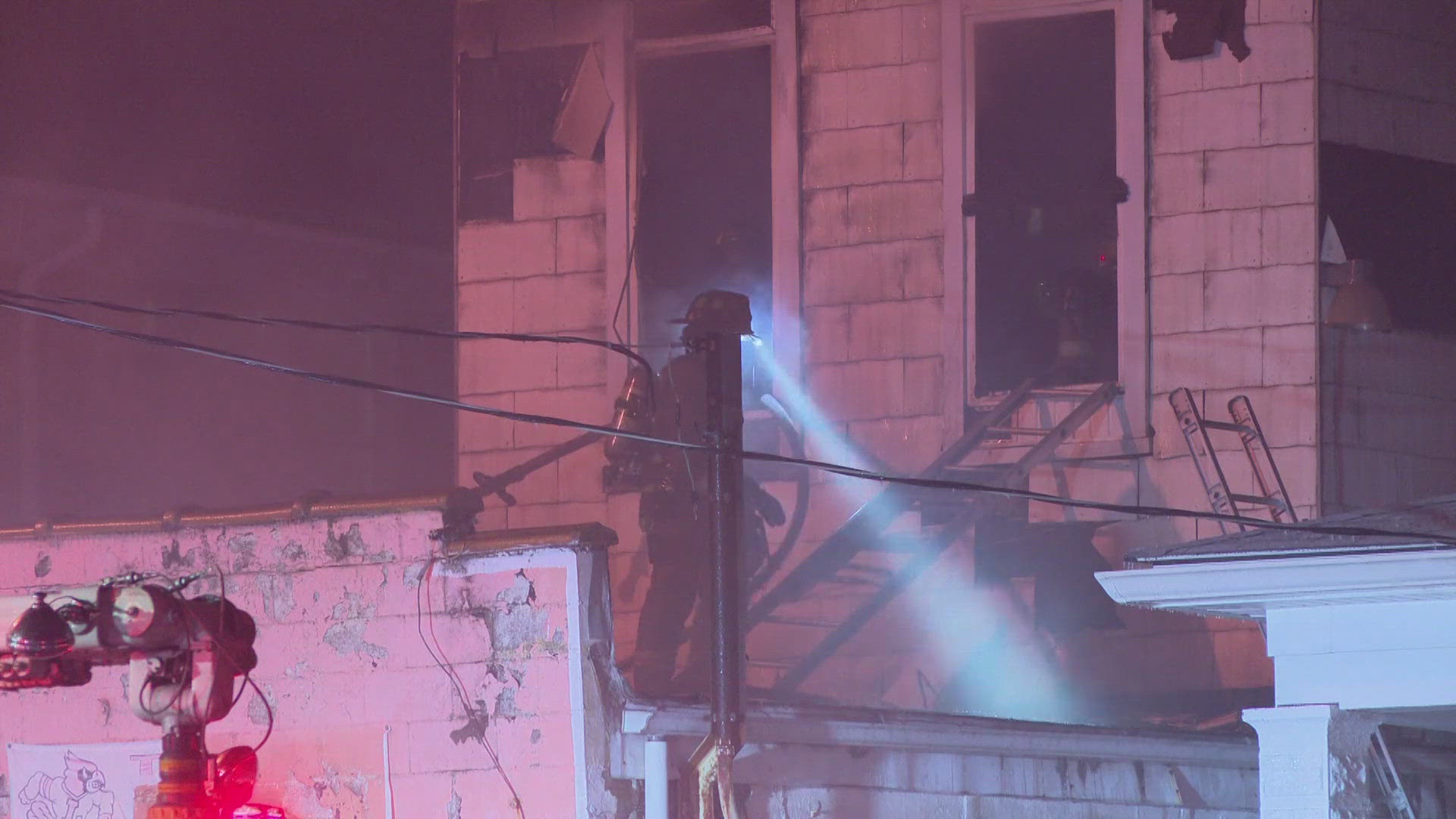 Louisville Fire fights house fire on Broadway