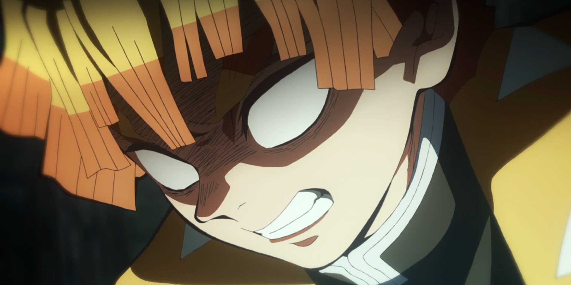 Zenitsu Agatsuma prepares to attack with eyes glowing white.