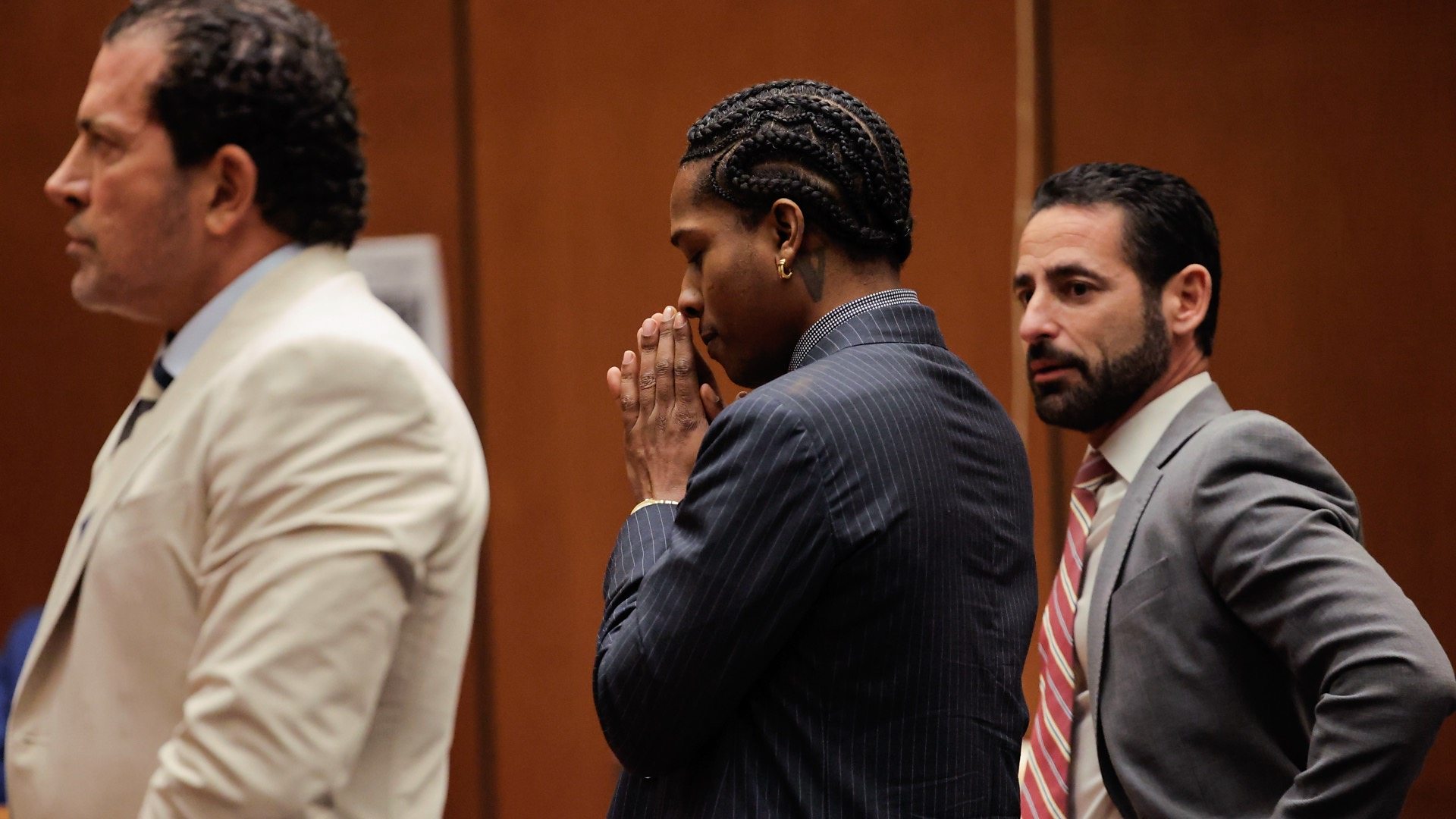 Watch: A$AP Rocky leaps over court barrier to hug Rihanna after verdict