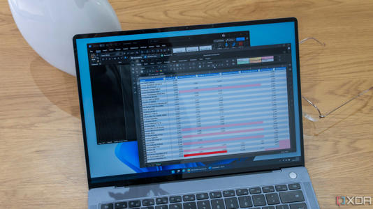 A Windows 11 laptop running OnlyOffice over a Microsoft Word window