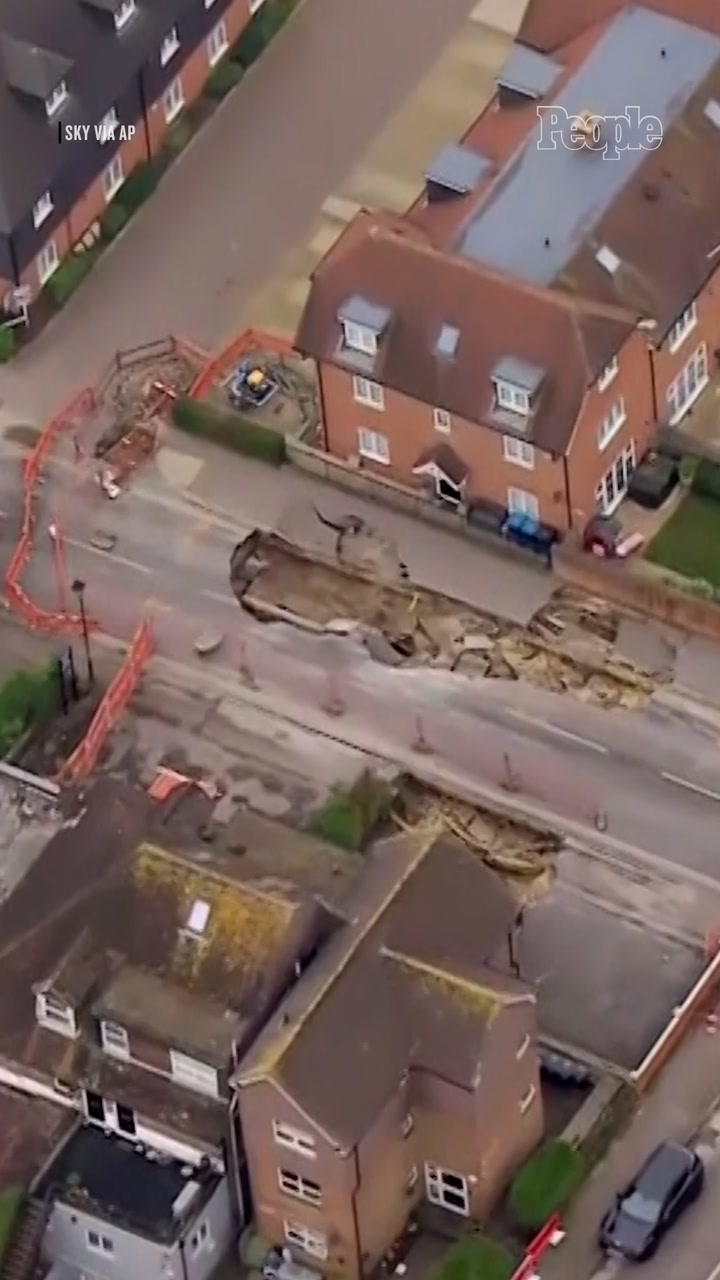 Giant 65Foot Sinkhole Swallows Up Street, Residents Evacuated