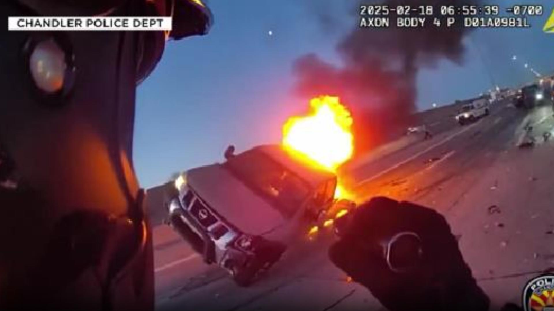 BODY CAM Police officer saves woman trapped in burning truck
