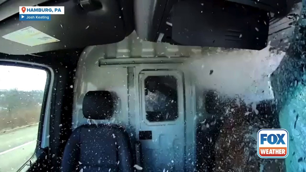 Driver survives nearfatal strike after flying ice shatters windshield