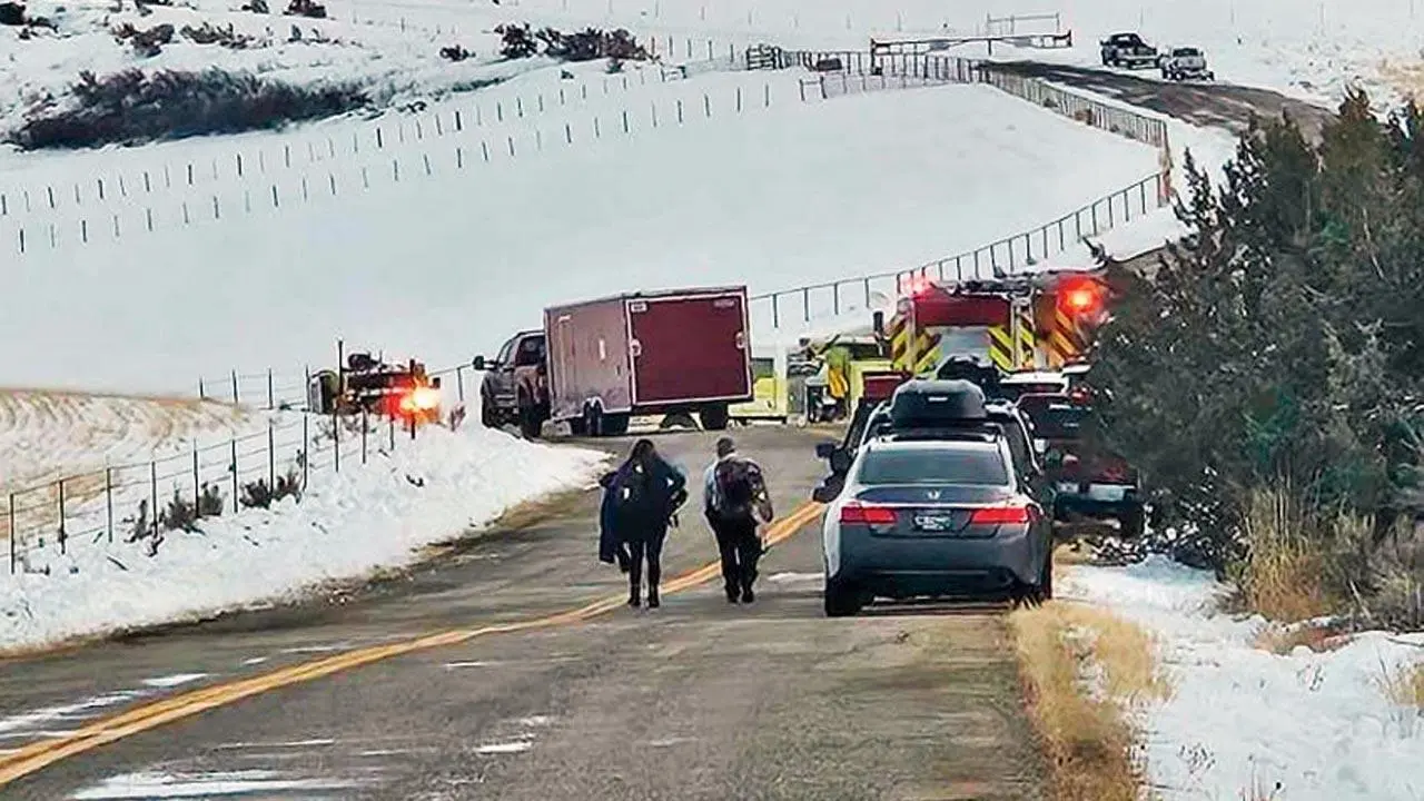 One dead, another hurt as chopper crashes onto icy reservoir in US