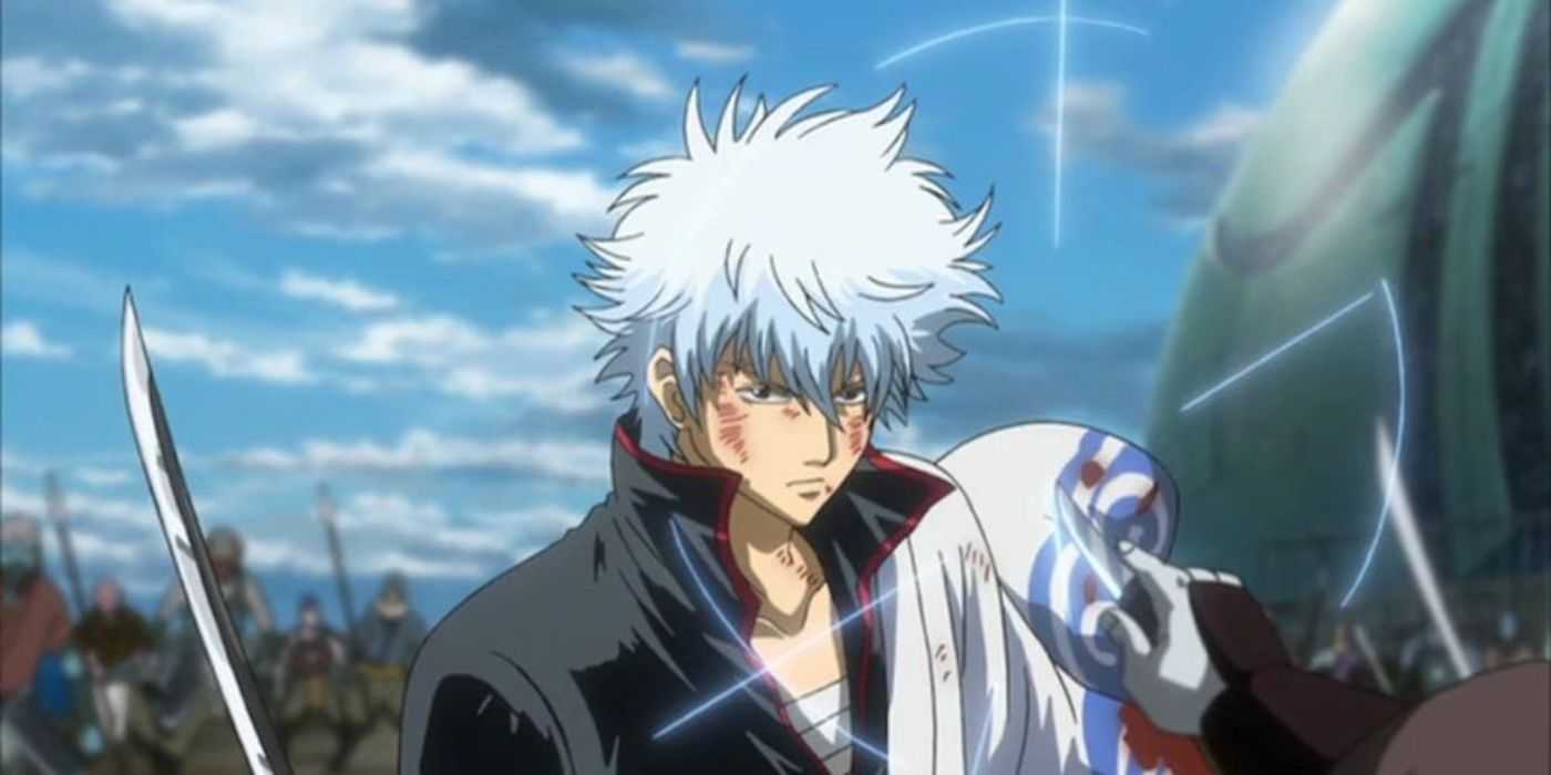 Sakata Gintoki has his sword drawn and looks injured as he fights in Gintama.