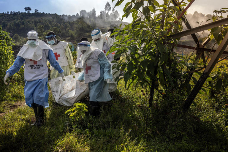 Recent clashes in the same Lubero district where the massacre of Christians took place show members of the Congolese Red Cross carrying body bags containing human remains during a mass burial for victims of the clashes in eastern Democratic Republic of Congo at Musigiko cemetery in Bukavu on Feb. 20, 2025. It is not clear from the picture whether the two events are related. The army of the Democratic Republic of Congo (DRC) on February 20, 2025, urged on local airwaves the soldiers fleeing in the eastern province of North Kivu to rejoin their units and continue the fight to counter the advance of the M23 rebels. In Lubero, a town toward which the M23 is advancing, 250 km north of the provincial capital Goma, taken on January 28, terrified residents reported to AFP Congolese soldiers in disarray shooting in the town and engaging in looting. Getty Images