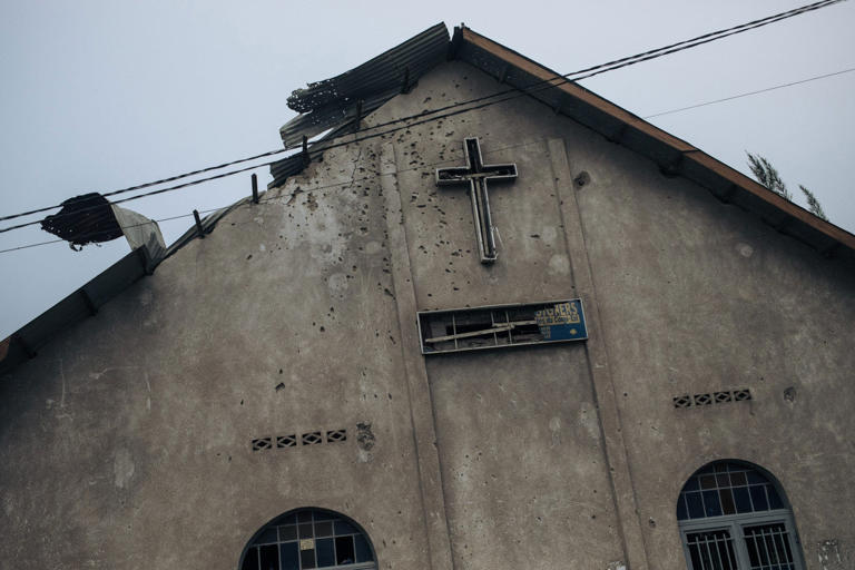 The facade of a church hit by an artillery shell following clashes is seen in Goma on Jan. 30, 2025. Getty Images