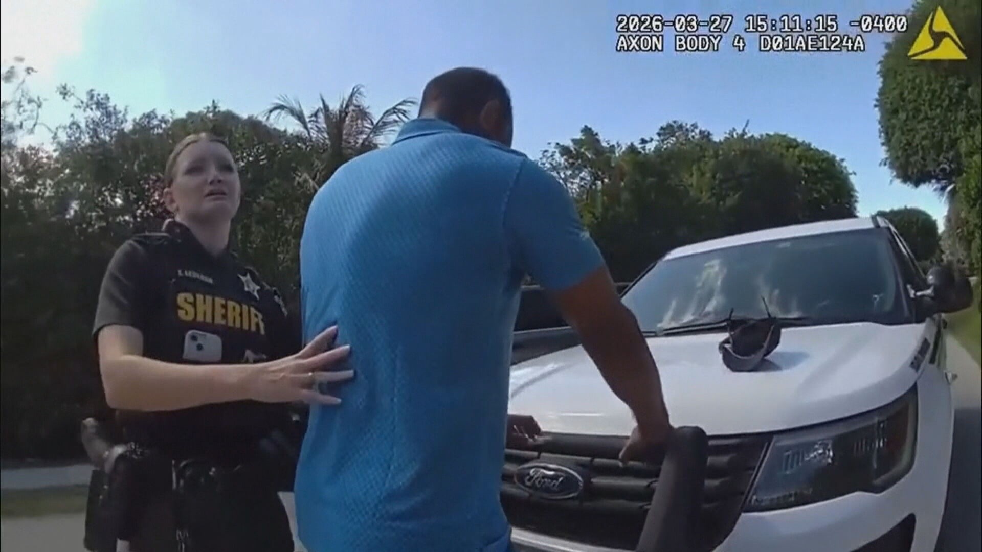 Bodycam shows Tiger Woods being handcuffed after rollover crash in Florida