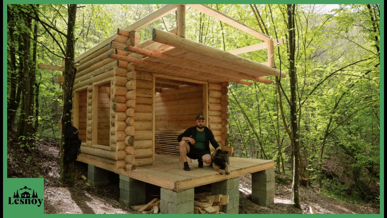 Solo log cabin construction: Traditional build from snowy forest to ...