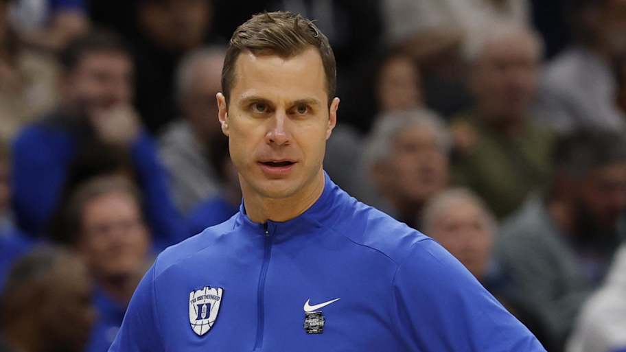 Mar 29, 2026; Washington, DC, USA; Duke Blue Devils head coach Jon Scheyer looks on against the UConn Huskies in the first half during an Elite Eight game of the East Regional of the men's 2026 NCAA Tournament at Capital One Arena. Mandatory Credit: Geoff Burke-Imagn Images | Geoff Burke-Imagn Images