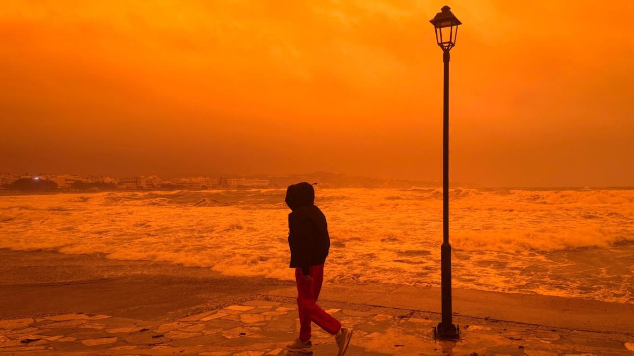 IN PHOTOS One dead as orange dust storm batters Greece with galeforce winds