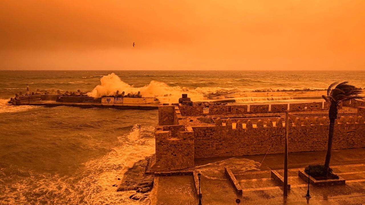 IN PHOTOS One dead as orange dust storm batters Greece with galeforce winds