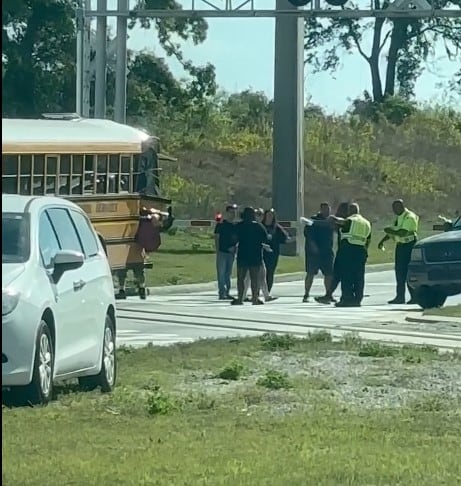 Duval students injured in crash involving school bus, tractor trailer ...
