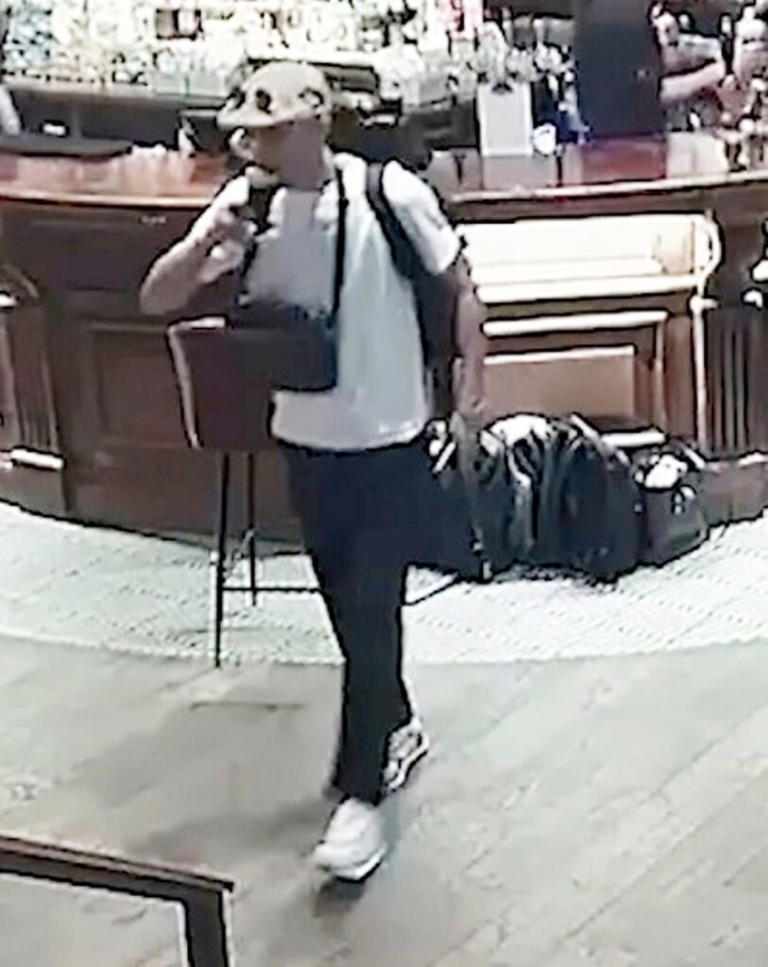 Thieves caught on CCTV rifling through bags in pub for seven minutes
