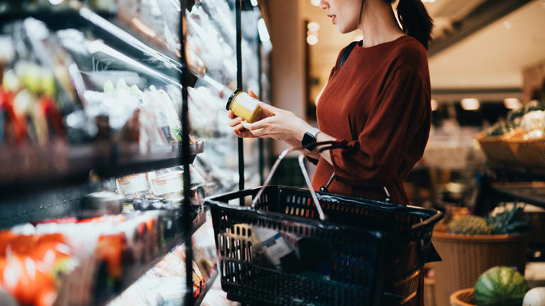 Is it okay to snack at the grocery store before checking out?