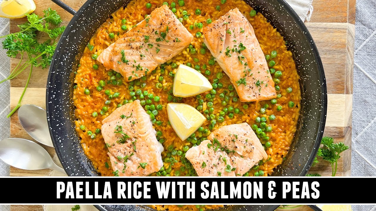 Spanish salmon paella with peas and authentic flavor