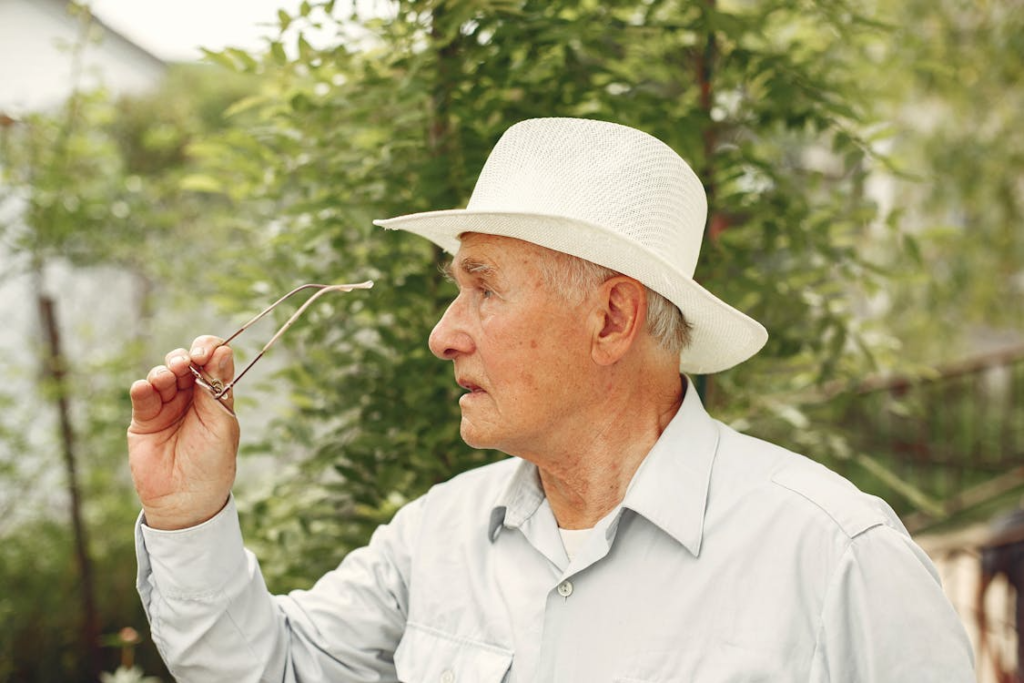 elderly man with glasses