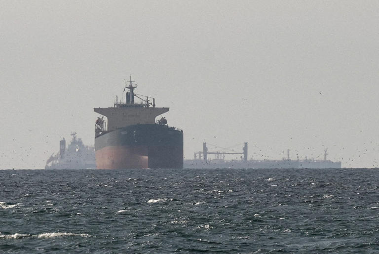 Cargo ships near the Strait of Hormuz, as seen from Ras al-Khaimah in the U.A.E.