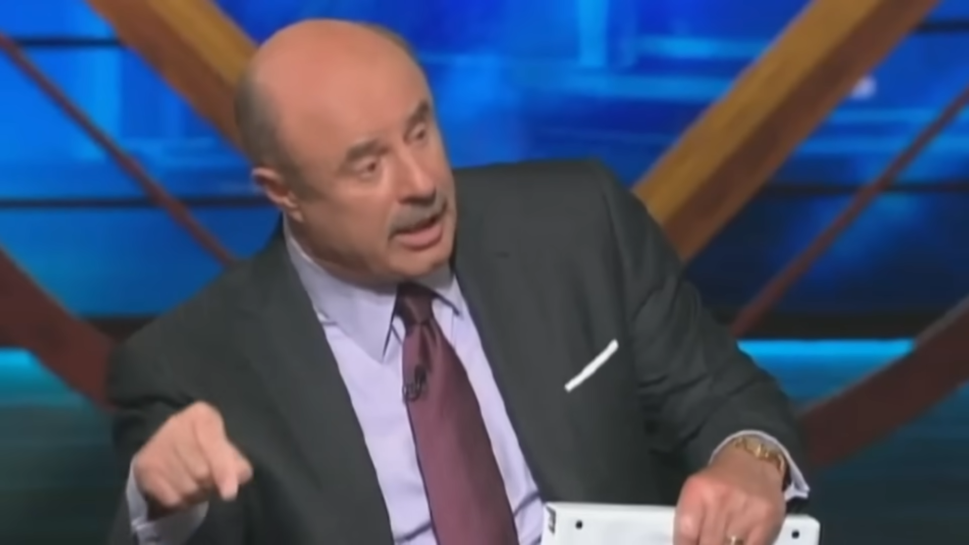 Dr. Phil shuts him down on TV - watch what happens next