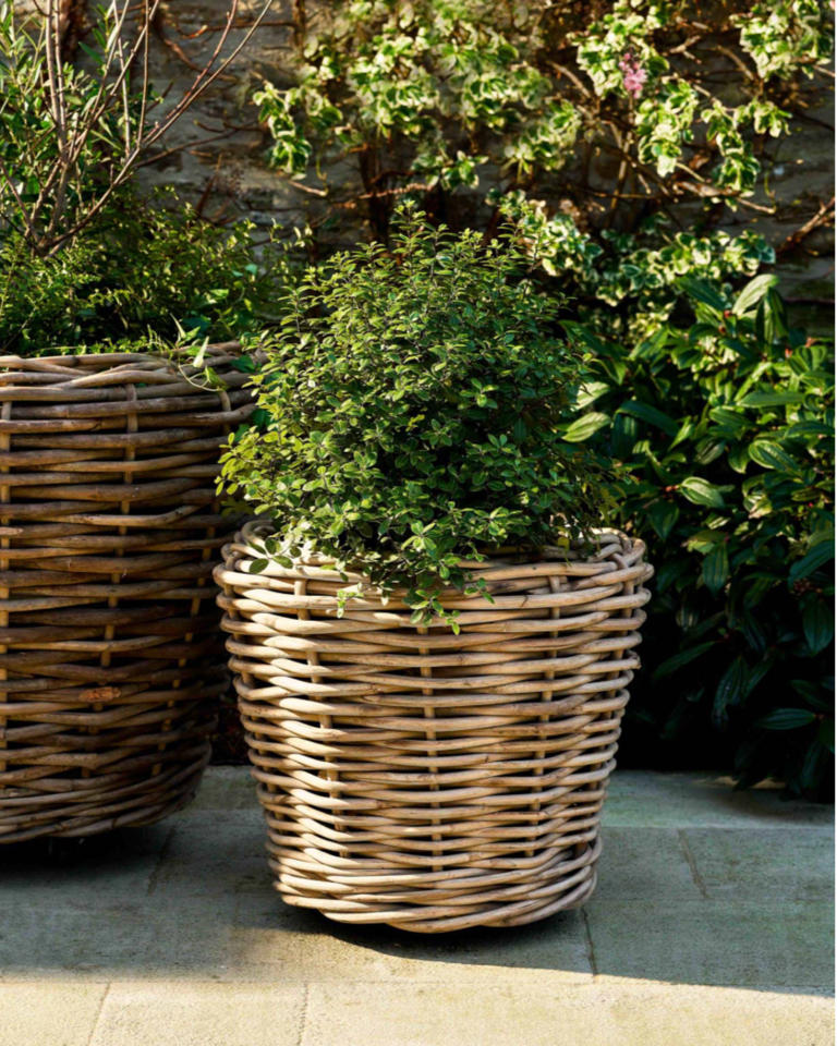 These outdoor wicker planters are ever-so stylish