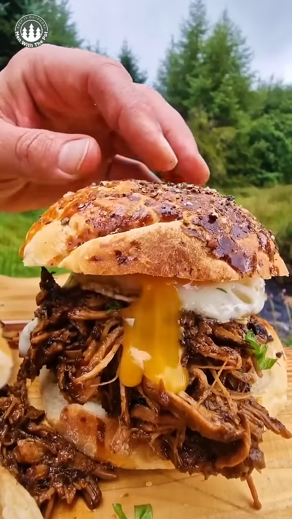 Watch how this pulled pork sandwich slowly comes together in the wild