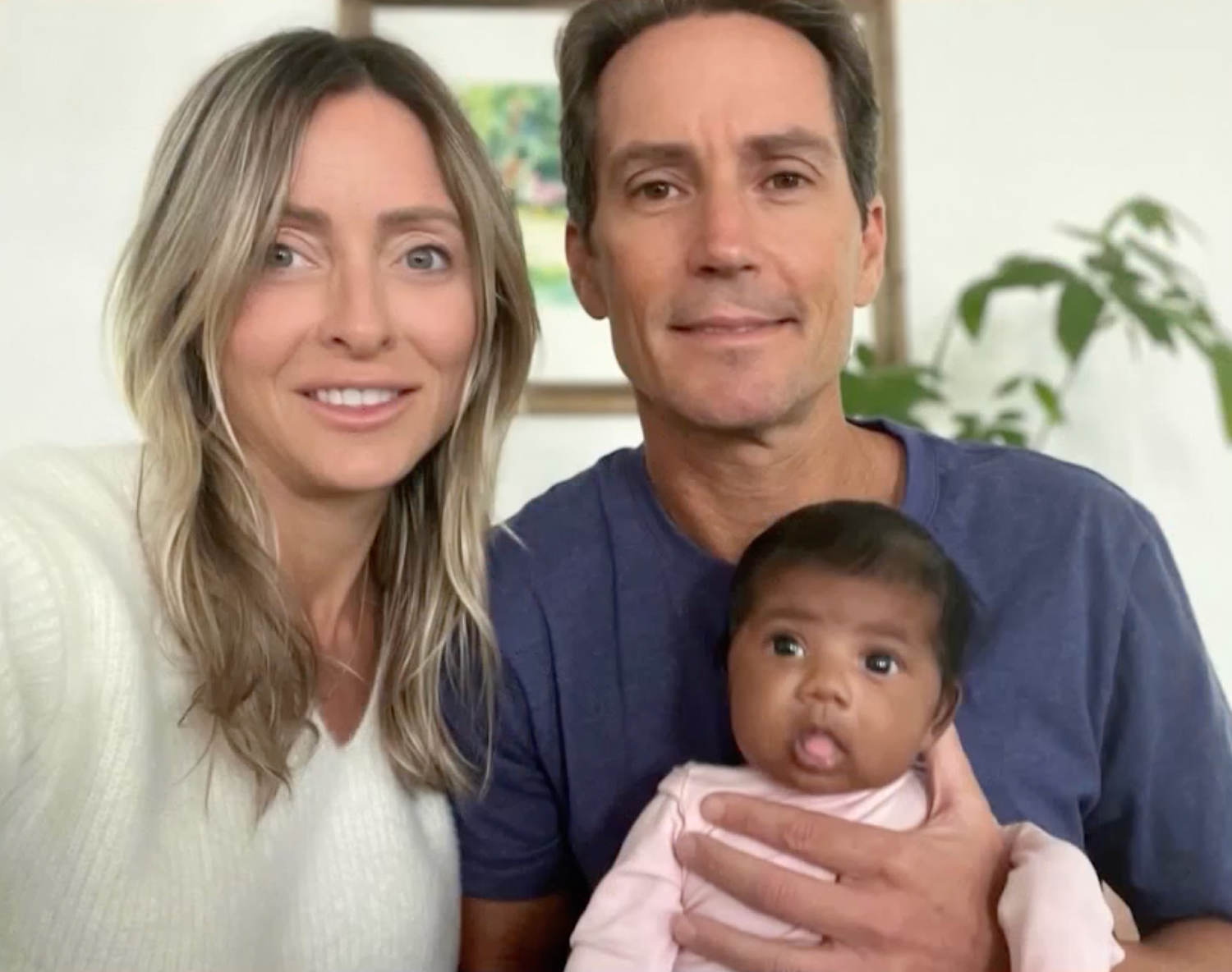 A group photo of Tiffany Score, Steven Mills, and their baby. (Courtesy of family attorney via WESH)