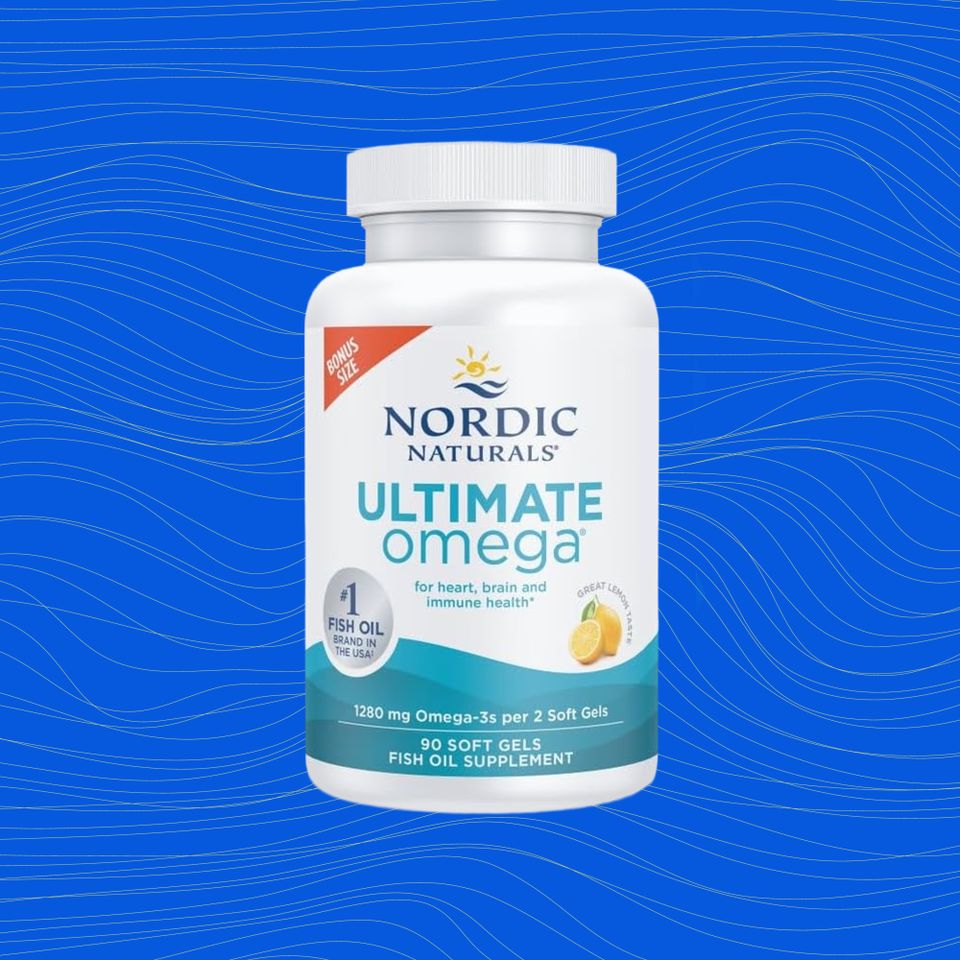 Bottle of Nordic Naturals Ultimate Omega supplement on a blue background