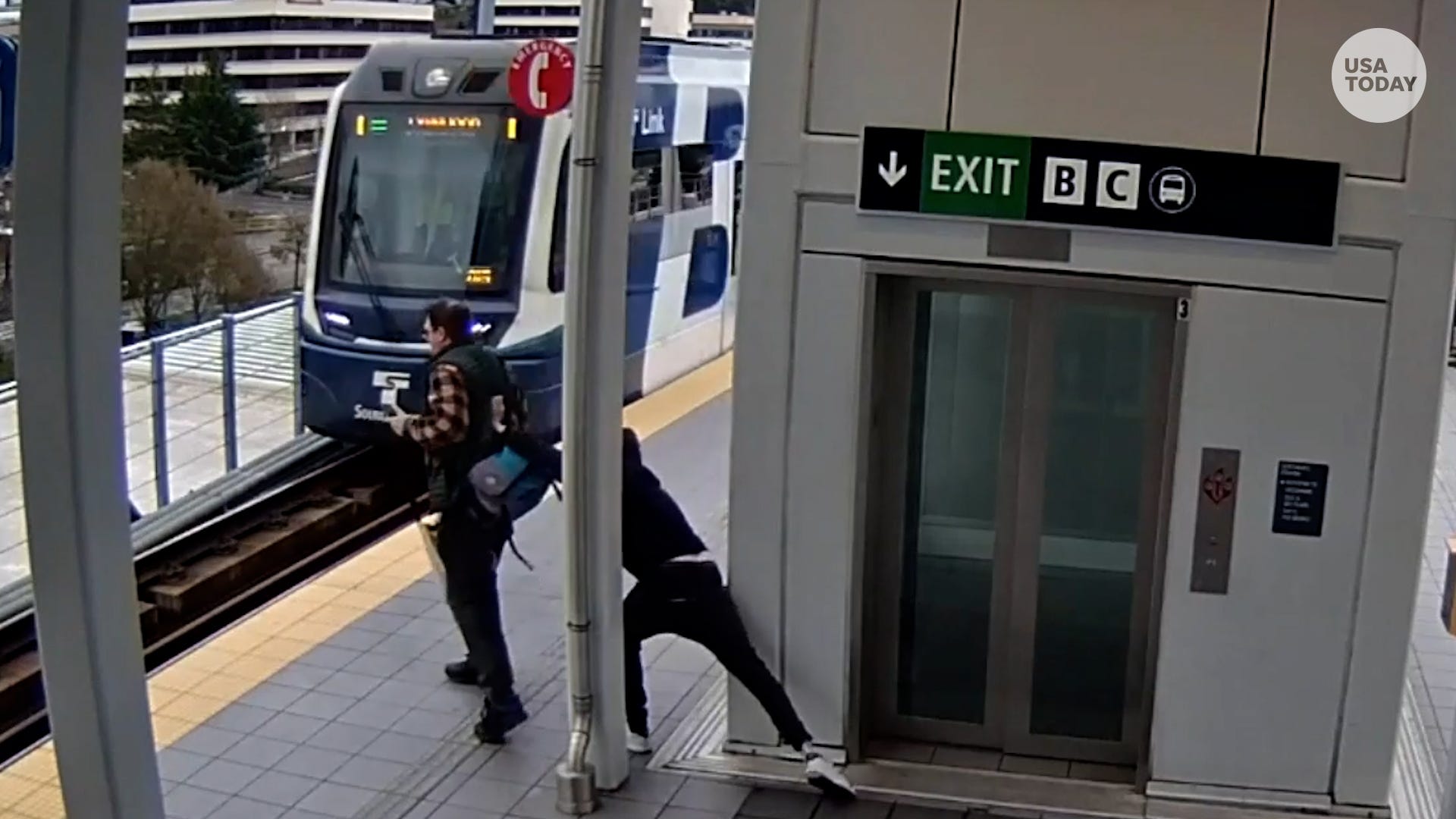 Video shows man attempt to push stranger in front of train in Seattle
