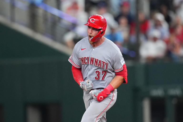 Reds beat Rangers 5-3 in their 1st road game with 3 homers, the last in ...