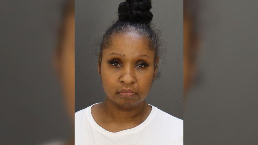 Woman accused of killing estranged husband in Baltimore shooting