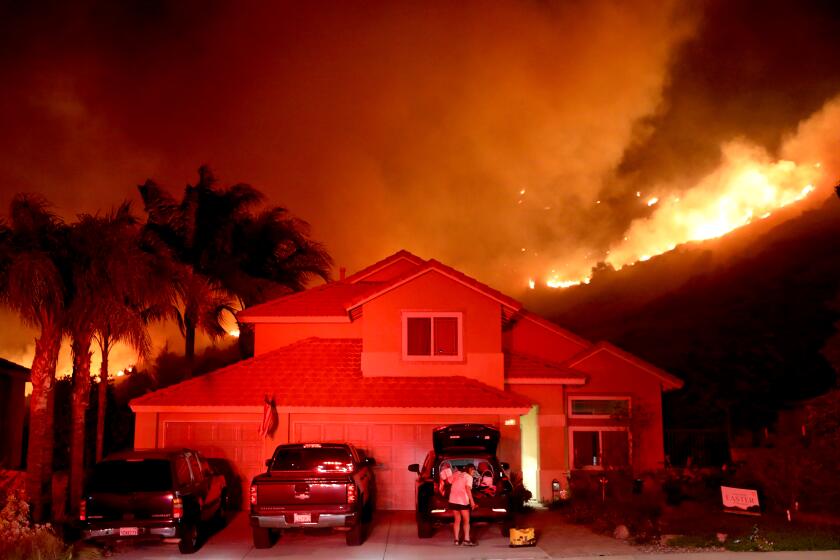 Two fires break out in Southern California amid Santa Ana winds, triggering evacuations<br>