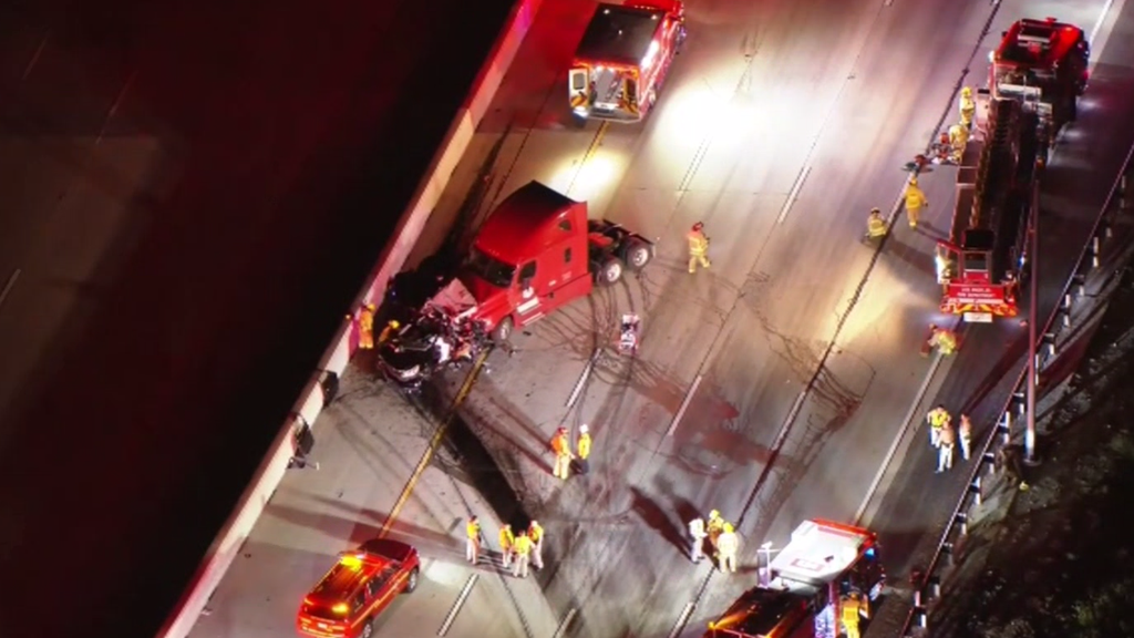 2 dead after semi-truck crashes into car stopped on side of 210 Freeway ...