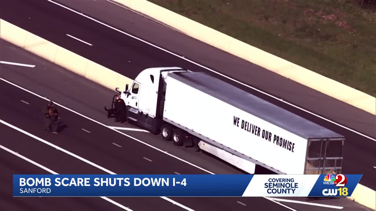 Video shows moment semi-truck driver arrested after bomb scare shuts ...