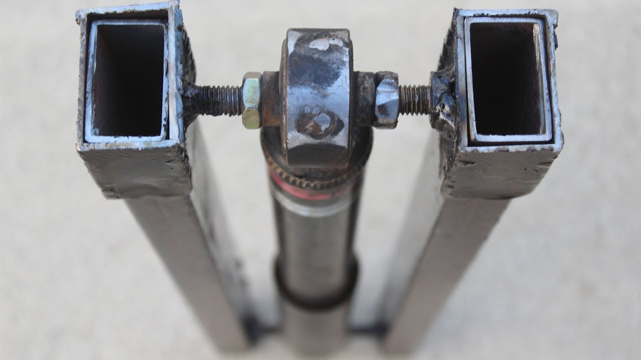 How to build a powerful DIY lever press from a shock absorber ...