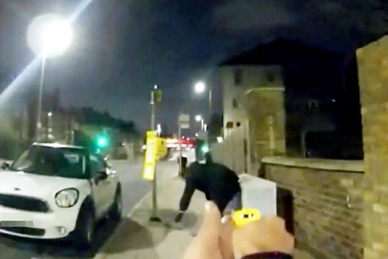 Terrifying moment 'stolen' Land Rover reverses over police car