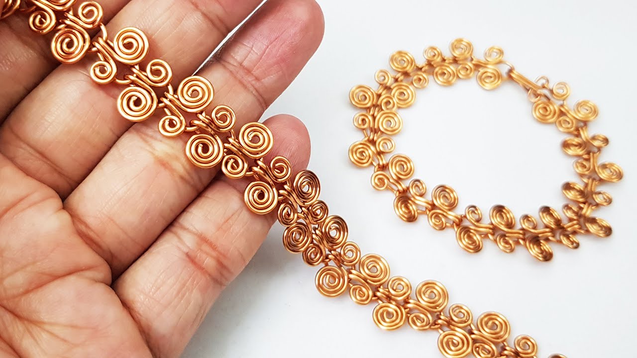 Asymmetric spiral bracelet inspired by Egyptian coil from copper wire 478