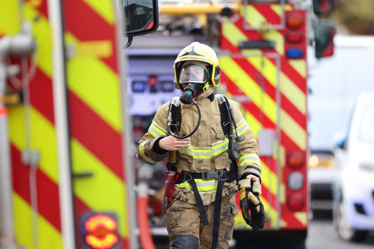 Fire breaks out at garage in Rochdale as roads closed off by emergency ...