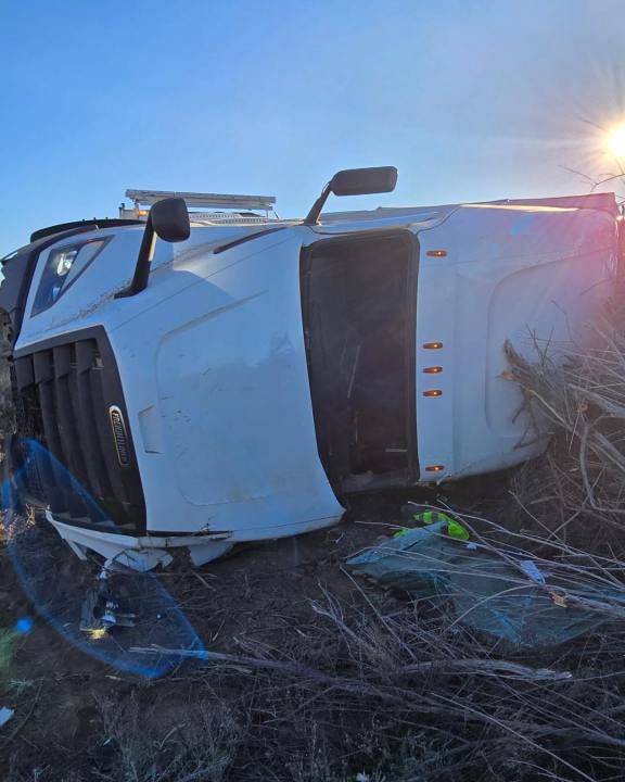 One transported to hospital in semi-truck rollover crash