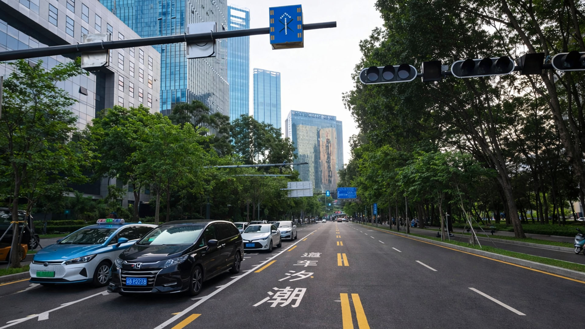 China city streets combine green spaces, smooth traffic and modern ...