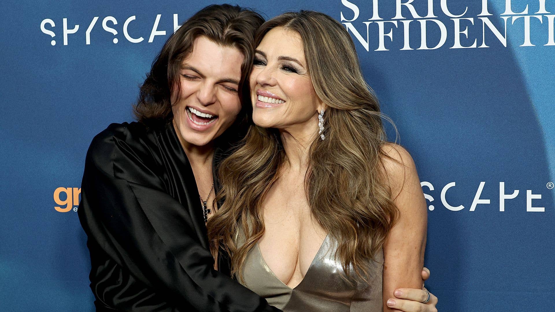 Elizabeth Hurley is besotted with lookalike son as he marks major ...