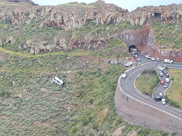 Tourist bus crash leaves one dead and 14 injured when vehicle plunges into  ravine on Canary Islands