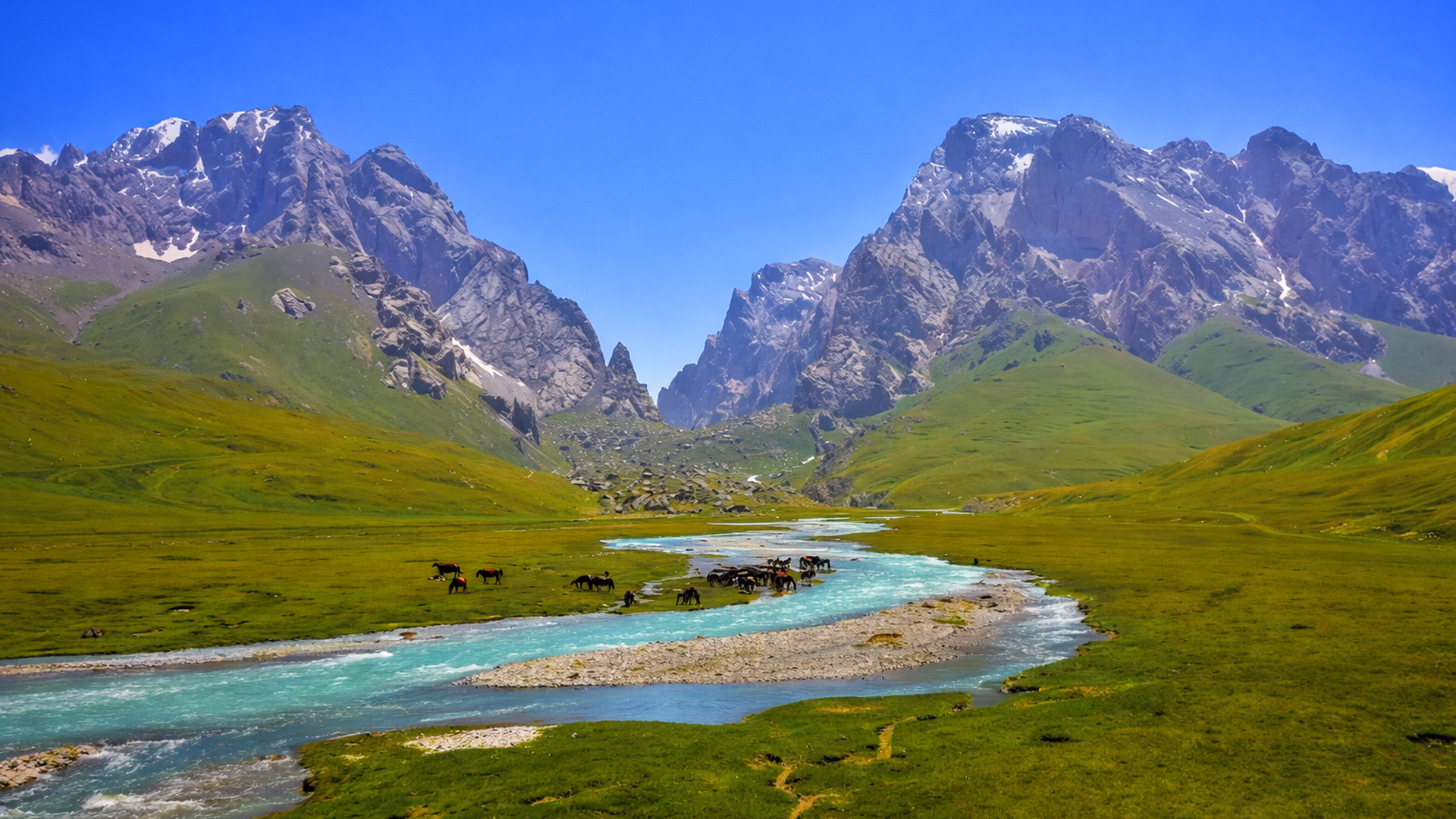 A hidden river flowing through a remote mountain valley