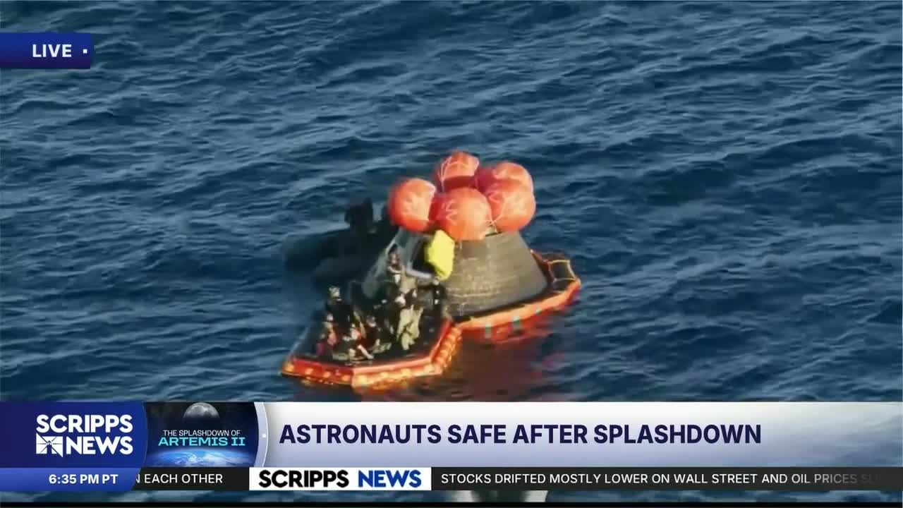 Artemis II crew members safely exit the capsule after splashdown