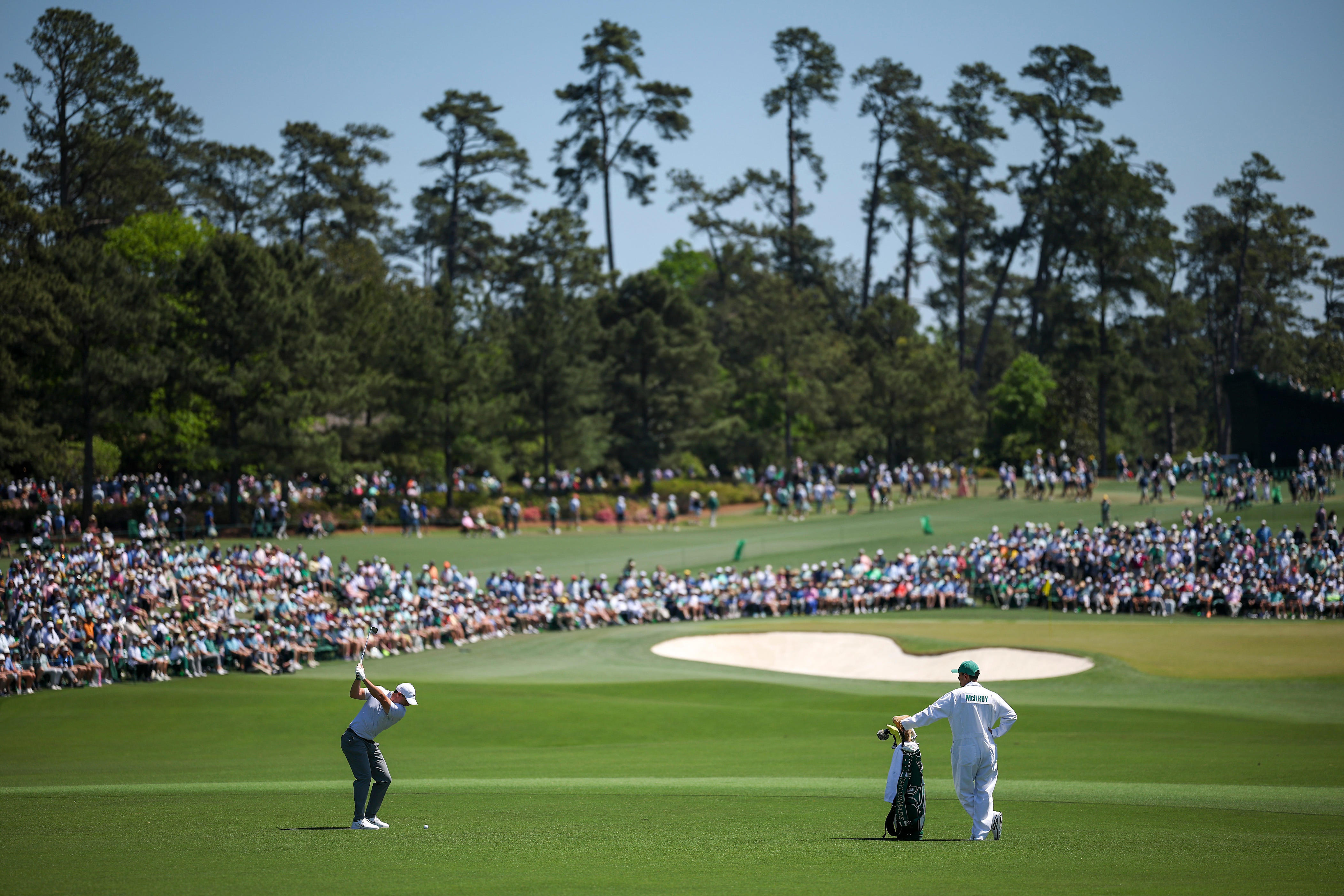Rory McIlroy holds the lead after round 2 at Masters. See photos